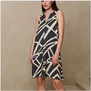 Like new, Banana Rep V neck Sleeveless Navy Patterned Trapeze Dress